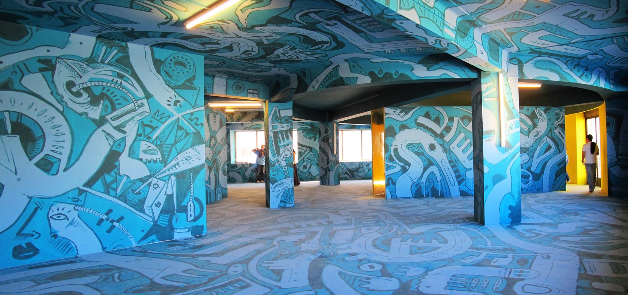 Muralista Porto abstract interior room painted blue forms and shapes muralista